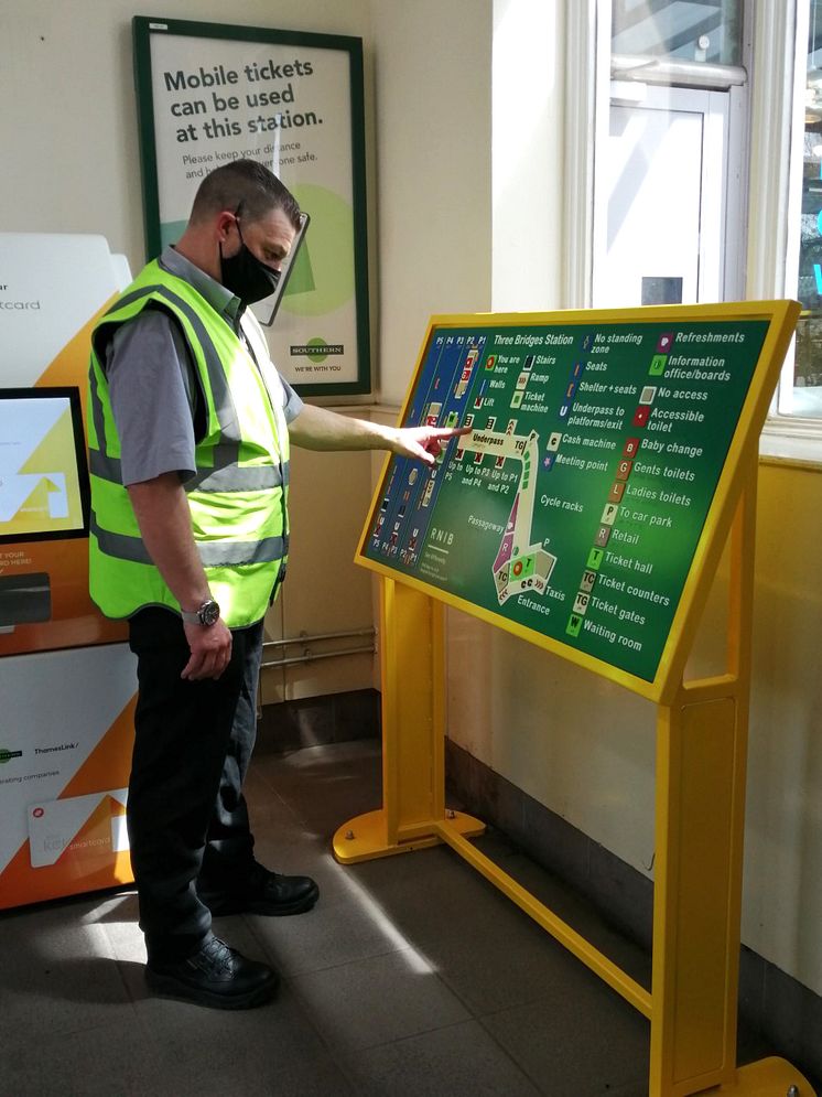 Three Bridges Team leader Darryl Stanley looks at the new tactile map