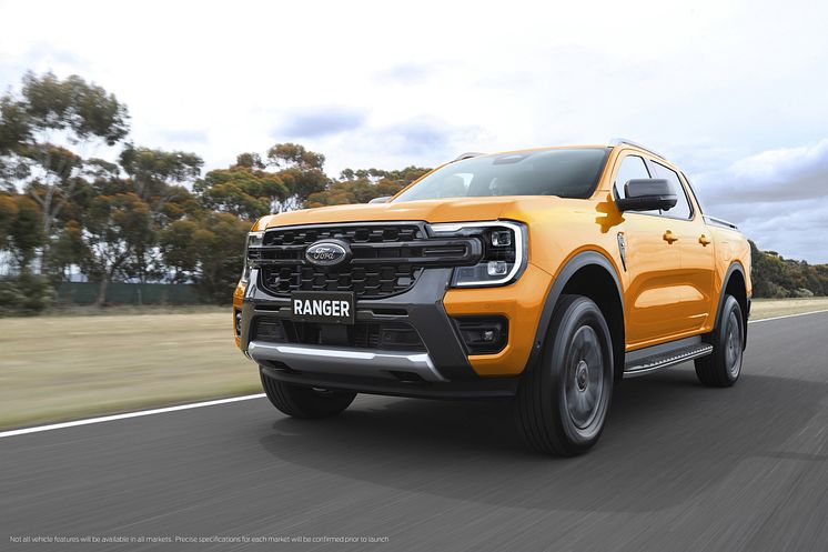 2022Ford_NextGenRanger_Wildtrak_Front3QTR_motion_tarmac