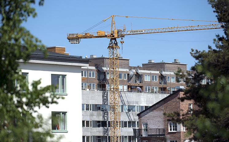 apartments and crane