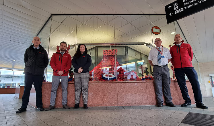 Poppy display - Phil Rayner (Assistant Operations Manager), Joel Halligan (Staff Manager), Leanne Irving (Staff Manager), John Gordon (Bus Station Supervisor), Neil Kennedy (Driver).png