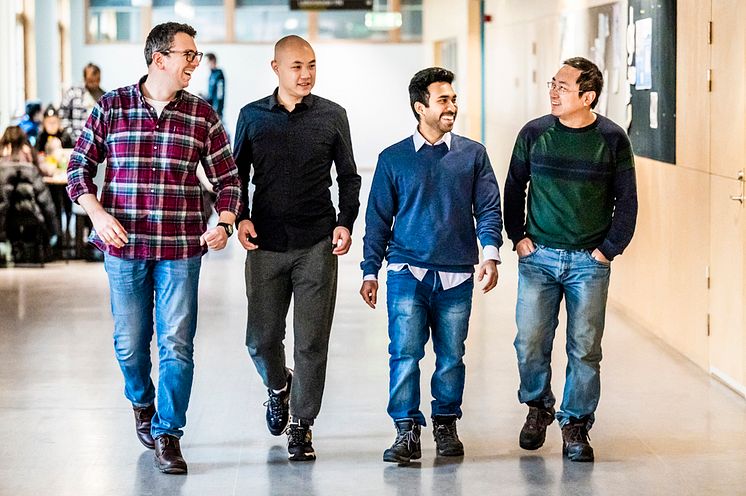 Artificial-organic-neurons-researchers on walk small