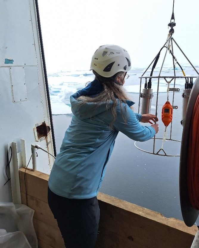 Eva Leu using a Fast Repetition fluorometer to measure in situ profiles of algal physiology by Ronny Johansen.jpg