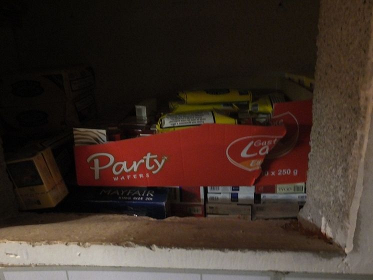 Op Batmobile - illicit tobacco products hidden in wall behind cupboard NW04/15