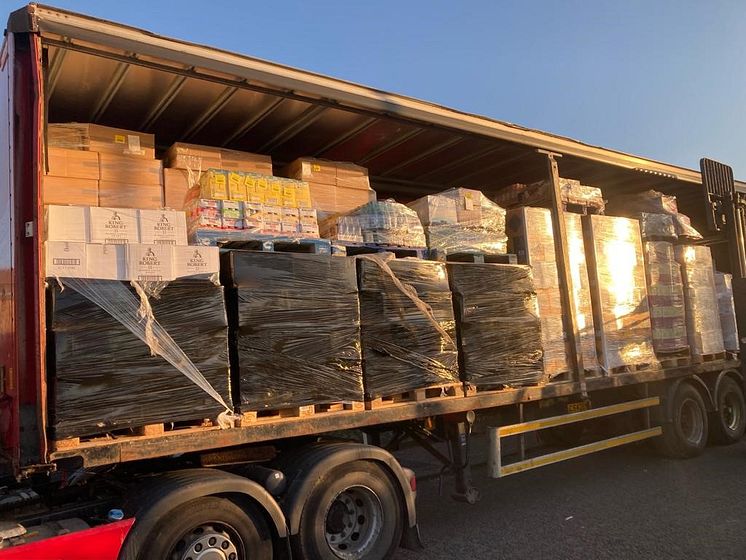 SCO NB 02 22 01 Illicit cigarettes and alcohol seized from a unit in Whitburn & loaded into a trailer by HMRC officers