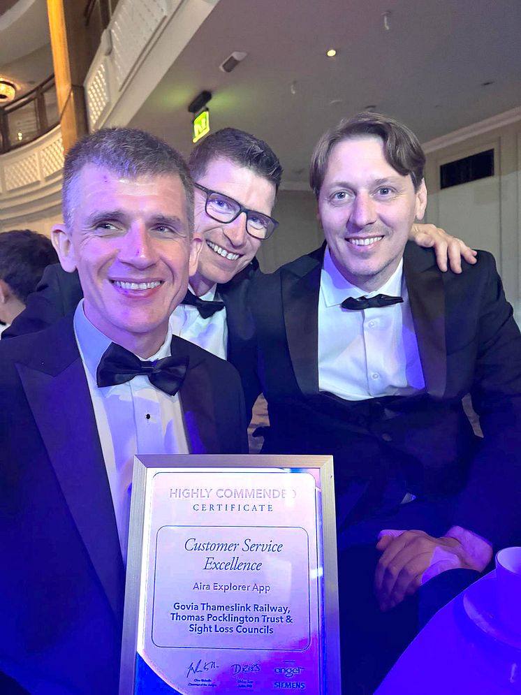 Dave Smith (left), and GTR's Roger Perkins and Carl Martin celebrate AIRA's highly commended award.jpg