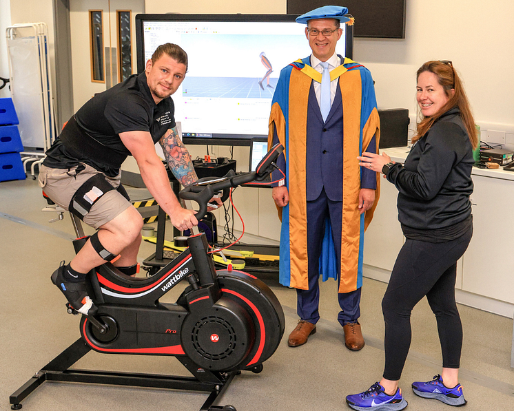 Jon Dutton is given a cycle training system demonstration by Northumbria staff