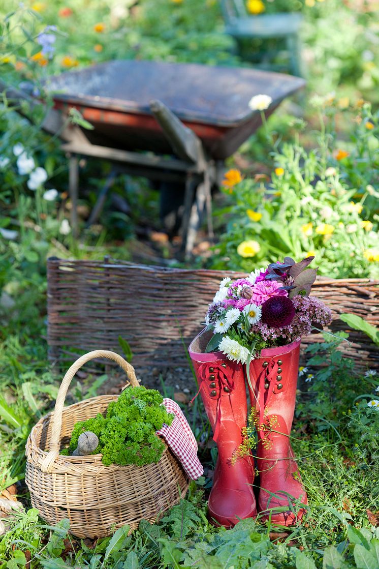 Blommor i gummistövlar