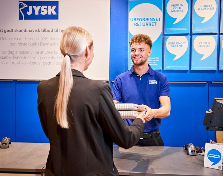 JYSK store employee with customer