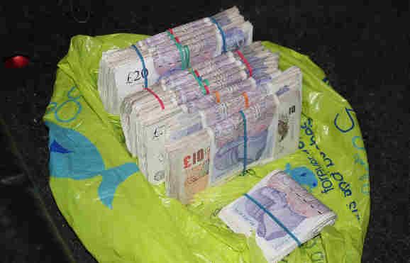 Op Quadrant Bundles of cash seized 2