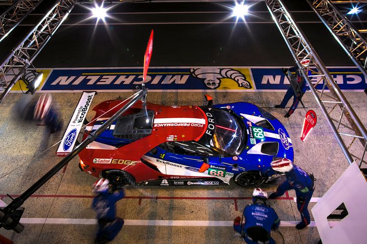 The 68 Ford GT dives into the pits at Le Mans