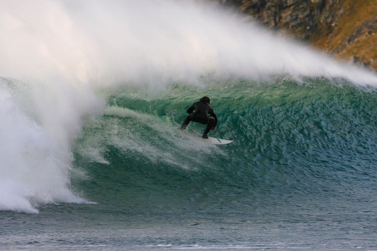 Surfing at Unnstad in Lofoten-Photo - Nils-Erik Bjørholt - VisitNorway.com.jpg