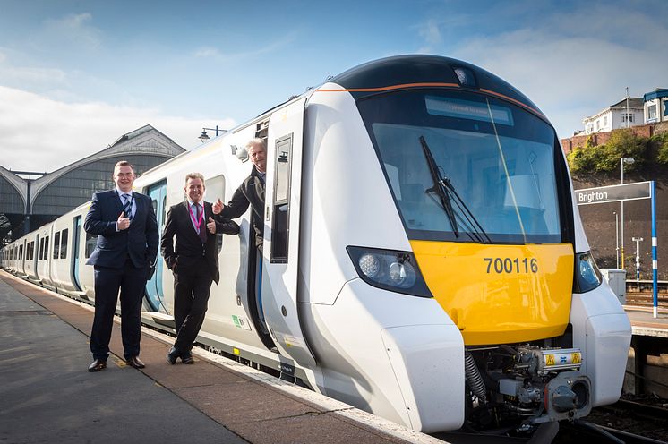 Carl Edwards, Station Manager at Brighton, and Paul Bradley (Driver Manager) give a thumbs up with train driver Alan Stacey at Brighton Station beforethe new 12-carriage Thameslink Class 700 departs at Brighton this
