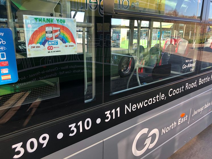 Rainbow poster on a Go North East bus in support of key workers