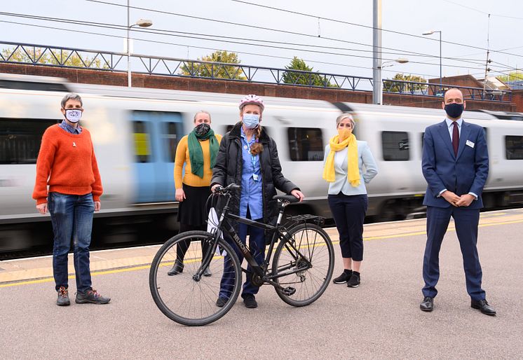 Nurse Jane O'Connor receives her refurbished bike at St Albans station.jpeg