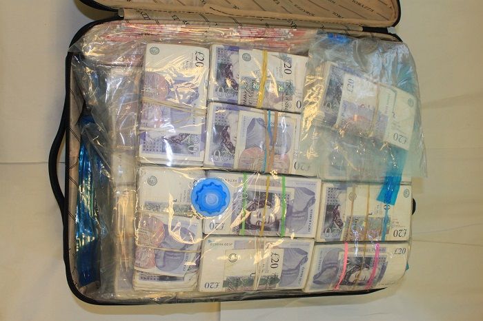 £1.5m cash seized and 13 arrested on suspicion of money laundering
