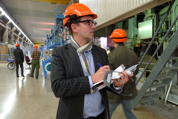 Open CEO David Gray takes notes on Invercote production at Iggesund