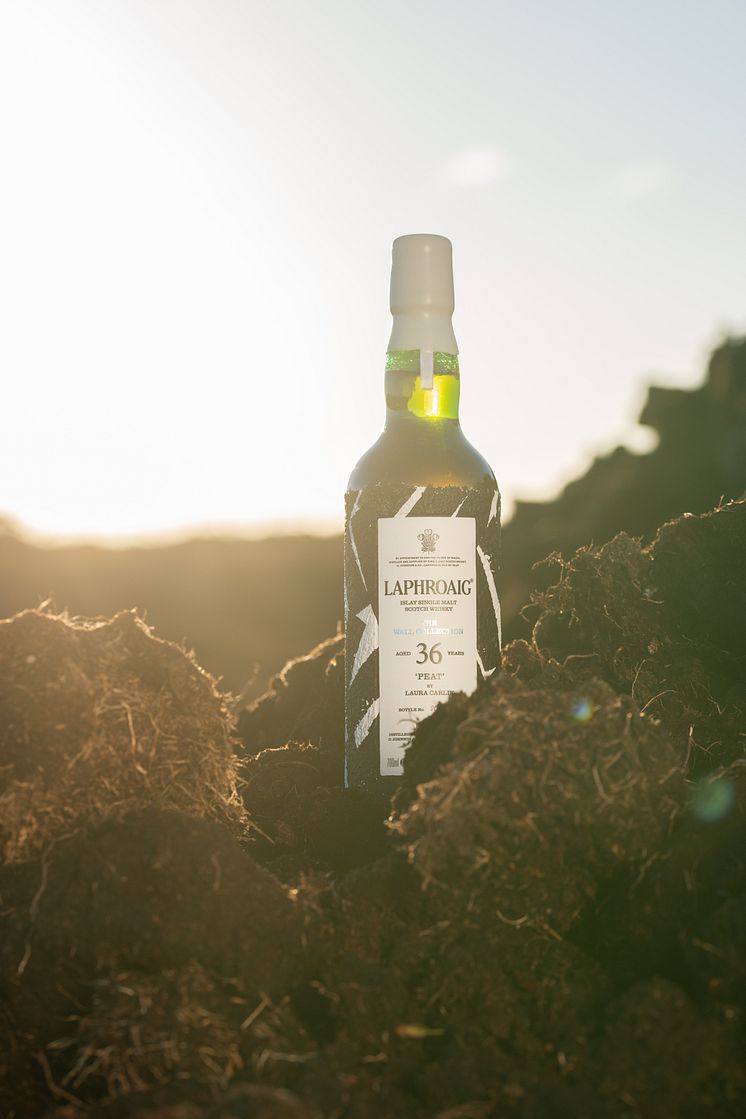 Laphroaig36YearOldWallCollection_BottleInPeatBricks.jpg