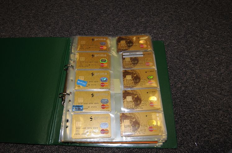 Credit cards with associated sim cards seized from John Farrell's house
