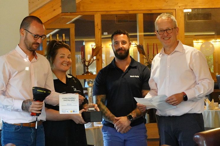 Karl Nye collecting on behalf of Chris Nicholls from Calmec - Indiviudal Stableford 1st Place presented by Lorna Kerrigan-Hall and Dave Curley