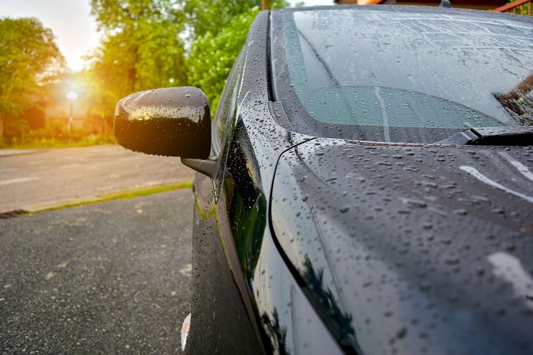Water droplets evaporating on a car