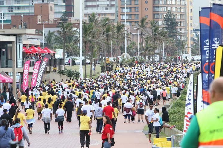 Walkers stream along the Durban promenade 