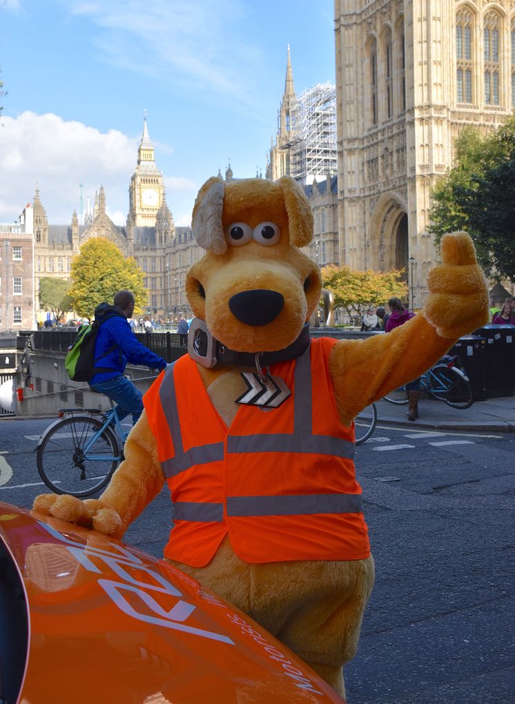 Horace waving with RAC patrol van and Big Ben