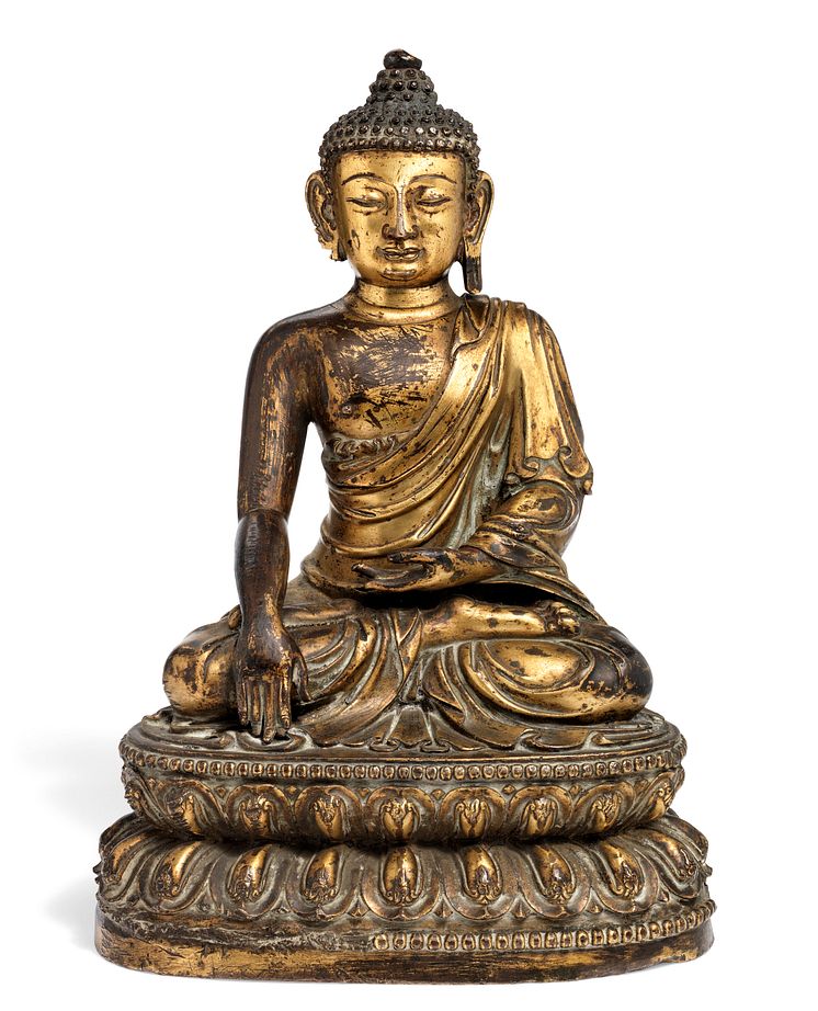 A Chinese gilt bronze figure of Buddha Shakyamuni. Hammer Price: DKK 1.8 million
