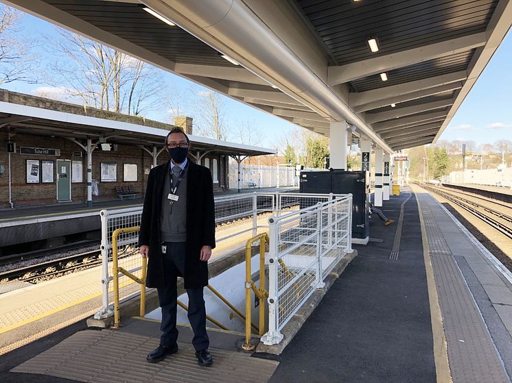 Tulse Hill station manager Steve Fleming under the new platform canopy  