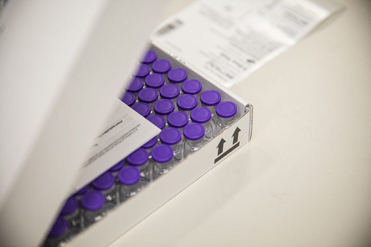 Boxed empty PfizerBioNTech vaccine vials