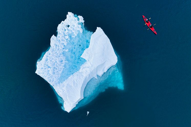 Leith Cove in Antarctica with a kayak and huge iceberg
