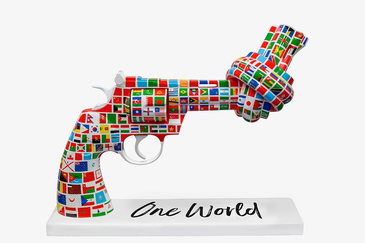 New Global Non-Violence Ambassador Johan Ernst Nilson and his knotted gun sculpture One World - to unite the world in peace.