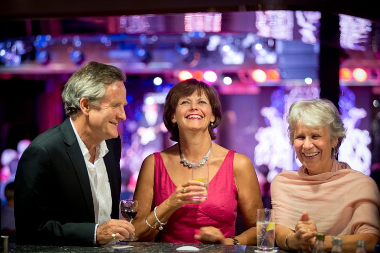 Friends enjoying drinks in the Neptune Lounge