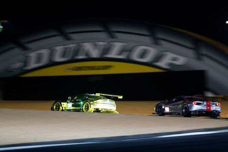Winning GTE Pro Aston Martin Vantage under the Dunlop bridge