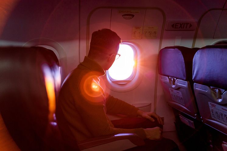 THEME_PEOPLE_MAN_AIRPLANE_FLIGHT_WINDOW_GettyImages-1148020488_Universal_Within usage period_98334