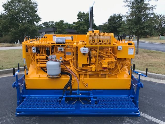 Image - Mastry Engine Center- The Puckett 580 asphalt paver with customized 3TNV88C-DYEM YANMAR Tier 4F engine from YANMAR Mastry Engine Center