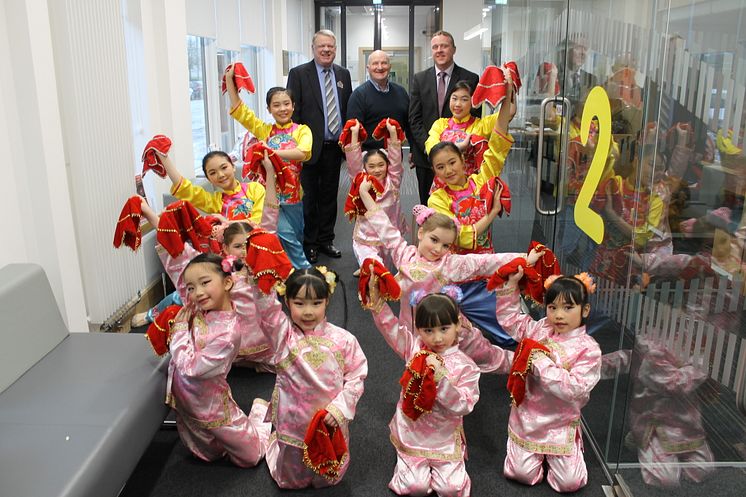 Local families Celebrate Chinese New Year in North Glasgow. ng homes Chairperson John Fury and CEO Robert Tamburrini are joined by Bob Doris MSP and dancers from Glasgow Oriental Dancing Association. 