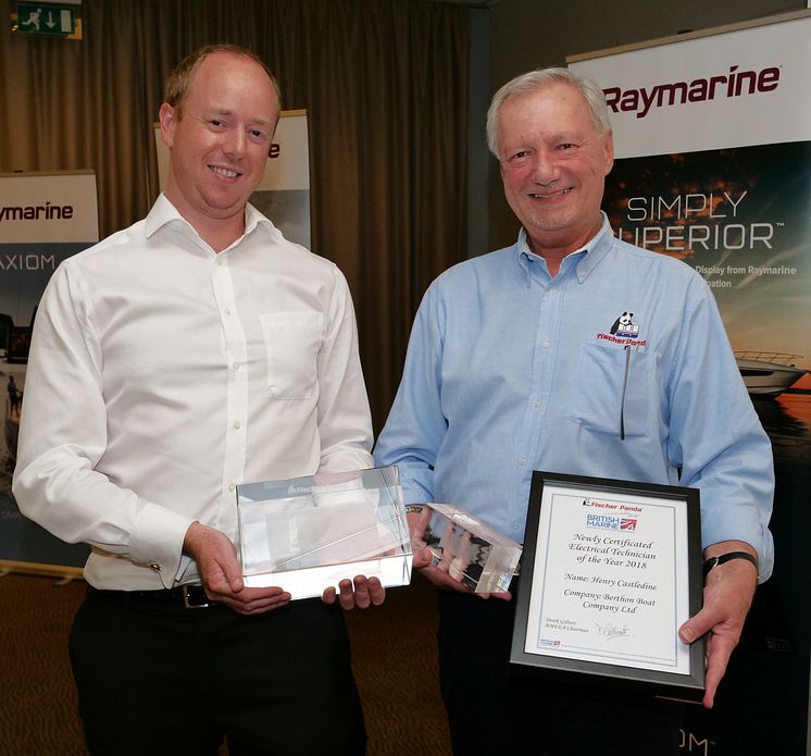 Hi-res image - Fischer Panda UK - David Melville from Fischer Panda UK presents the Fischer Panda award for the Newly Certificated Electrical Technician of the Year to Henry Castledine of Berthon Boat Co