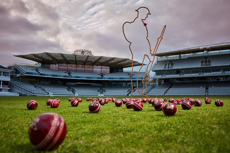 Tommy figure in front of the Warner Stand