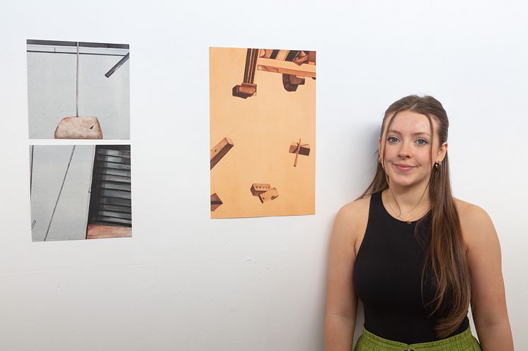 Freelands painting prize  winner, Holly Smith, with some of her work