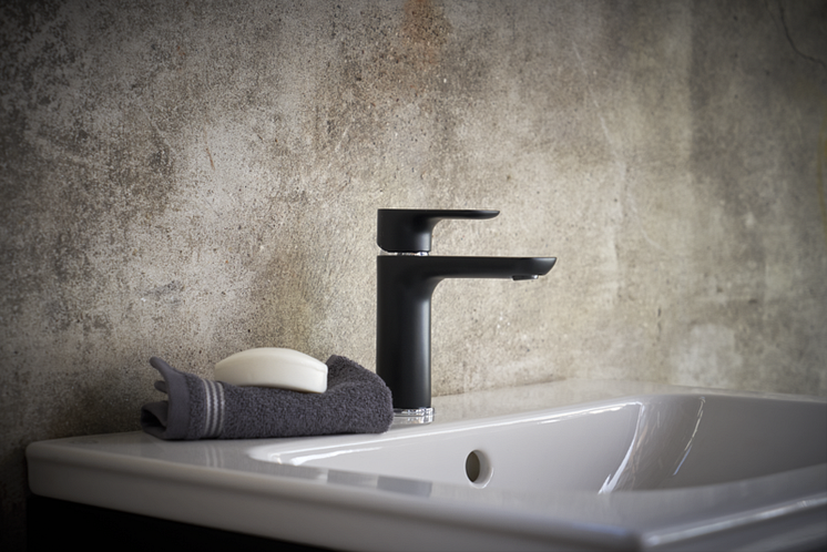 Black (matte) Estetic tap on a green Graphic bathroom cabinet. 