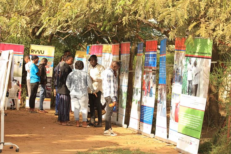 Photographs taken by young refugees were turned into a travelling exhibition which has already been staged at universities and refugee settlements in Uganda.