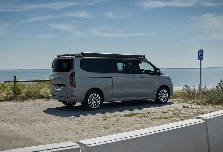 2024FordTransitNuggetLWBTitanium_3_3-4_rear.jpg