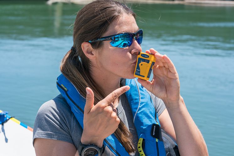 Hi-res image - Ocean Signal - Lia Ditton with the Ocean Signal rescueME PLB1 Personal Locator Beacon 