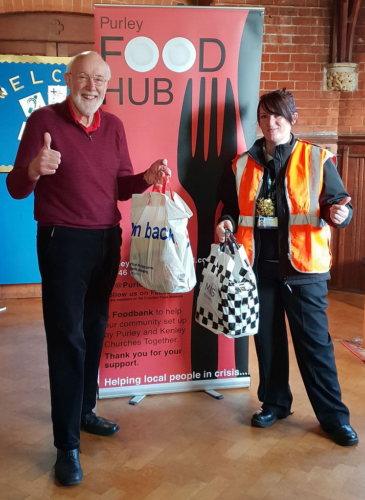 181217 Southern driver Laura McDonald and food bank administrator Steve Hunt, with the donations for Purley Food Hub