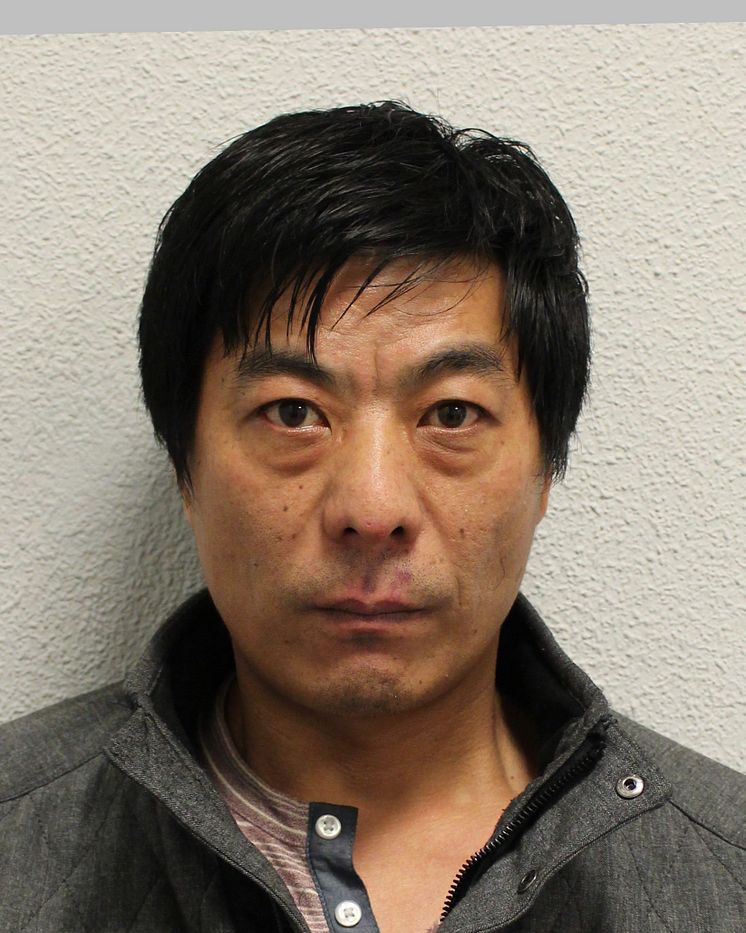 On-the-run cigarette smuggler behind bars. Shou Chen (pictured) is still at large