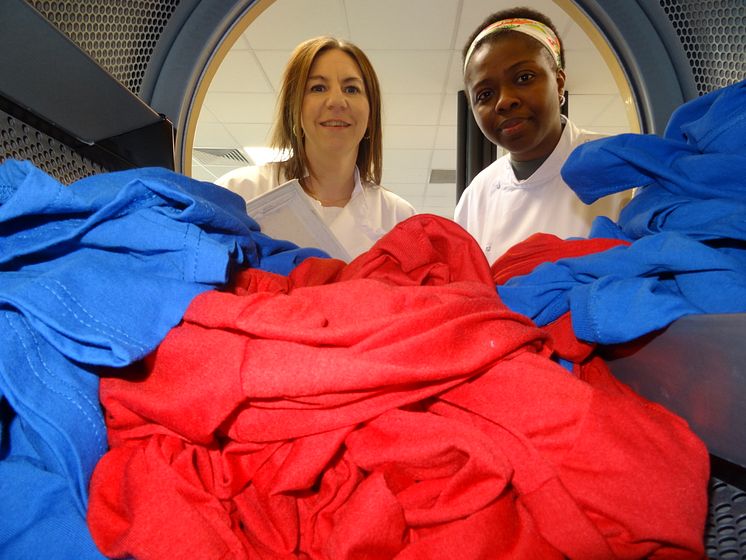 Test load in a tumble dryer - Kelly Sheridan and PhD student Chimdia Kechi Okafor.JPG