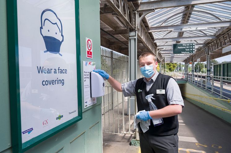 Karl Wingate helps to keep his station clean