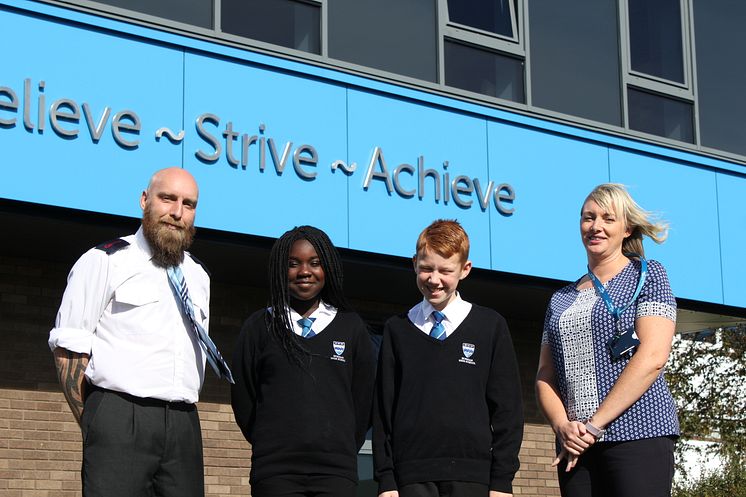 Phillip Barnfather from Go North East and Rebecca Rutter from Age UK North Tyneside with students from Norham High School.