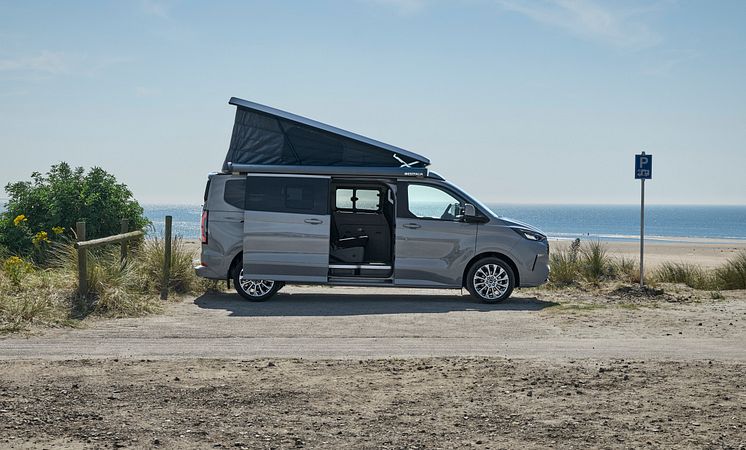 2024FordTransitNuggetLWBTitanium_4_side.jpg