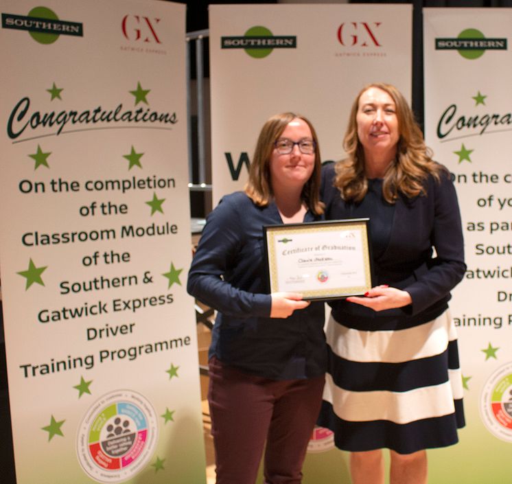 Brighton trainee driver Claire Jackson of Bexhill-on-Sea receives a certificate for completing her classroom training from Southern and Gatwick Express MD Angie Doll